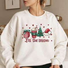 Tis The Season Sweatshirt, Christmas Tis The Season Sweatshirt, Merry Christmas Gift Shirt, Family Christmas Sweatshirt, Cute Winter Hoodie You are welcome to Tabithas Fashion store! I'm here to help you to have a good shopping experience as much as I can. If you have any request (more size and color options) please feel free to message me. I will reply as soon as possible. * Please note: This design will be made with Direct To Fabric print (DTF). * I have listed some information to help you bel Casual Christmas Hoodie With Crew Neck, Christmas Hoodie With Letter Print And Crew Neck, Christmas Cotton Hoodie With Crew Neck, Christmas Cotton Crew Neck Hoodie, Casual Holiday Hoodie With Crew Neck, Casual Crew Neck Hoodie For Holiday, Gifts For Baseball Lovers, Merry Christmas Gift, Winter Hoodie