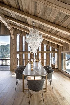 the instagram page shows an image of a dining room with wooden walls and ceilings