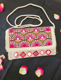 ~ Handcrafted boho sling bag: A perfect blend of rustic charm and effortless style ♥️ ~ It is handmade with beautiful aari and real mirror work✨️ ~ It has sling belt attached. Use it with or without sling belt ~ Pair it up with your ethnic or western wear ~ For any query contact us at 360-901-9890 Festive Beige Rectangular Shoulder Bag, Handmade Beige Bags For Festive Occasions, Rectangular Bag With Mirror Work For Gift, Rectangular Bags With Mirror Work For Gifts, Handmade Beige Shoulder Bag For Festivals, Traditional Summer Pouch Shoulder Bag, Pink Rectangular Shoulder Bag With Handwork, Festive Rectangular Shoulder Bag With Mirror Work, Bohemian Handmade Potli Bag For Everyday Use