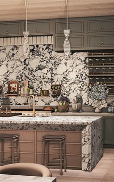 a kitchen with marble counter tops and stools in front of the island, surrounded by gray cabinets