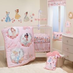 a baby's bedroom with princess bedding and accessories