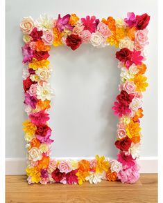 a colorful flower frame on the floor