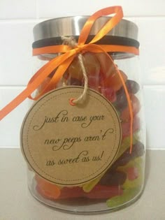 a jar filled with lots of gummy bears