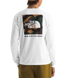 From The North Face&#x2C; this t-shirt features:Standard fitRibbed crew neck and cuffsLong sleevesNo-hand&#x2C; water-based&#x2C; screen-printed logo on the left chestBox logo graphic on the backPullover constructionSelf and rib of climate-conscious cottonMachine wash/tumble dryImported. The North Face Sporty Crew Neck Top, Sporty Crew Neck Top By The North Face, White Crew Neck Top By The North Face, Sporty White The North Face Tops, Sporty White Tops By The North Face, Sporty White Tops From The North Face, North Face Brand, Mens Tee Shirts, North Face Mens