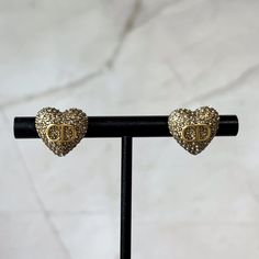 Size: 1cm by 1cm Material: Stainless Steel, Cubic Zirconia Plating: 18k Real Gold Earrings are 100% nickel-free and cadmium-free Earrings are hypoallergenic and tarnish resistant Gold Cubic Zirconia Pierced Heart Earrings, Luxury Heart-shaped Cubic Zirconia Earrings, Gold Heart Earrings With Cubic Zirconia, Luxury Gold Double Heart Earrings, Gold Cubic Zirconia Earrings With Heart Charm, Gold Earrings With Diamond Accents In Double Heart Shape, Heart-shaped Gold Cubic Zirconia Earrings, Gold Heart-shaped Earrings With Diamond Accents, Gold Heart Shaped Earrings With Diamond Accents