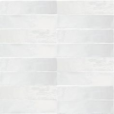 a white tile wall that is very clean