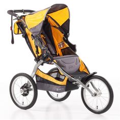 a yellow and black stroller on a white background