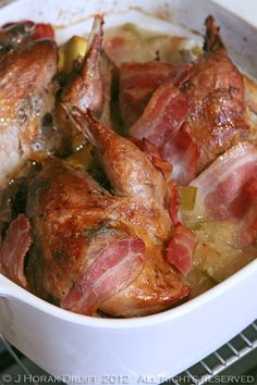 ham and potatoes cooking in a pot on the stove