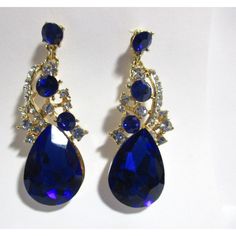 Stunningly Beautiful Blue +Cear Cluster Stones Gold Tone Dangle Pierced Earrings Size: 2.25" Long X 3/4"Wide Very good condition. Luxury Blue Cluster Earrings Gift, Luxury Blue Cluster Earrings As Gift, Stone Gold, Pierced Earrings, Earings Piercings, Beautiful Blue, Jewelry Earrings Studs, Favorite Jewelry, Etsy Earrings