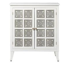 an ornate white cabinet with glass doors and metal hardware on the bottom, against a white background