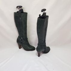 Green women's knee length leather boots with round toe gogo style. 90's to 2000's fashion. The soft leather of these boots is very comfortable, they fit well around the shin. Beautiful buckles on the sides, and a stable heel will emphasize the beauty of your feet. These heeled vintage boots are one of a kind. Limited edition in good condition. Additional photos can be sent upon request. Materials: leather, steel, metal The circumference calf width: 13,5 Inches Heel height: 3,3 Inches Boots heigh Winter High Heel Knee-high Boots With Buckle Closure, Winter Knee-high Platform Boots With Buckle Closure, Fitted Knee-high Heeled Boots With Buckle, Fitted Knee-high Heeled Boots With Buckle Closure, Knee-high Winter Boots With Buckle Closure, Fitted Knee-high Boots With Buckle Closure And Round Toe, Leather Knee-high Boots With Buckle For Winter, Vintage Knee-high Platform Boots, Fitted Platform Boots With Buckle Closure