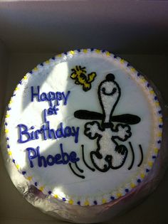 a birthday cake in a box with the words happy birthday phoebe on it