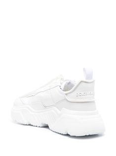 White Lace-up Platform Sneakers With Leather Sole, Designer Sneakers With Vulcanized White Sole, Luxury Chunky Sneakers With Rubber Sole, White Sneakers With Leather Sole And Round Toe, Casual White Platform Sneakers With Leather Sole, Textured Sole Calf Leather Sneakers For Streetwear, Calf Leather Sneakers With Textured Sole For Streetwear, Streetwear Sneakers With Textured Sole And Calf Leather, Streetwear Calf Leather Sneakers With Textured Sole