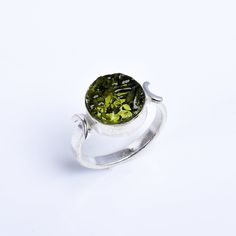 Man Made Moldavite Ring Green Moldavite Ring Moldavite Jewelry Statement Ring 925 Sterling Silver Rings for Women Green Stone Ring ►Product Details:- >>Metal- 925 Sterling Silver >>Gemstone- Moldavite >>Gemstone Color- Green >>Stone Shape- Cushion >>Weight- 5gm Approx ►Sterling Silver Ring:- Silver can fight against harmful infection and disease. Many have reported improvements in energy levels and balance in moods after wearing silver. Silver has a proven track record as a powerful antimicrobia Adjustable Green Round Birthstone Ring, Adjustable Round Peridot Ring, Adjustable Peridot Ring, Half Moon Ring, Moldavite Ring, Healing Crystal Ring, Moldavite Jewelry, Green Stone Rings, Moon Ring