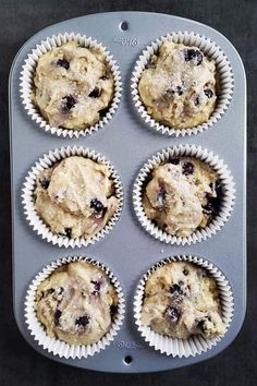 blueberry muffins are in the pan ready to go into the freezer