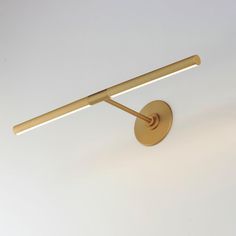 an image of a modern brass wall light