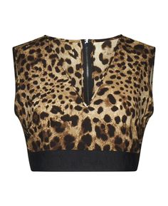 Best price on the market at italist | Dolce & Gabbana Leopard Printed Sleeveless Top | Get ready to stand out with our Dolce & Gabbana Leopard Printed Sleeveless Top that's all you need to turn heads this summer! The print is bold; the style, undeniably chic. Ideally paired with your skinny jeans or a flirty summer skirt. Don't miss out! Shop now and follow @FlirtyFeline for the finest #leoprint fashion. #leoprint fashion. #SpringFashion #WildStyle #WomensFashion #ChicOutfit #FlirtyFeline #afflink #shopping #shoppingonline #shopmycloset #shopwithme #shop #animalprintstyle #outfit Leopard Print Fashion, Silk Crop Top, Satin Crop Top, Feminine Chic, Black Sleeveless Top, Animal Print Fashion, Printed Sleeveless Top, Summer Skirts, Women's Fashion Dresses