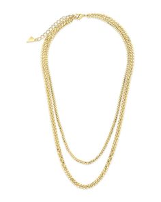 Layer up! This layered curb chain necklace is simple yet chic -- perfect for wearing with any outfit, and in any place. Available in gold and silver tones and adjustable in order to ensure a perfect fit. Materials: 14K gold ﻿or﻿﻿ rhodium plated brass Features: Measures 16-18" with 2" extender, Lead & Nickel free, lobster clasp Layering Curb Chain Link Necklace, Curb Chain Link Necklace For Layering, Double Strand Curb Chain Necklace, Gold Double Strand Curb Chain Necklace, Trendy Double Strand Gold Chain Necklace, Trendy Gold-tone Double Chain Necklace, Chic Gold-tone Layered Double Chain Necklace, Chic Gold-tone Double Chain Layered Necklace, Trendy Multi-strand Gold Chain Necklace