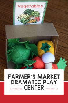 the farmer's market dramatic play center is made out of felt and paper vegetables