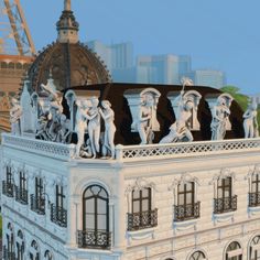 an image of a building with statues on the roof and in front of a cityscape