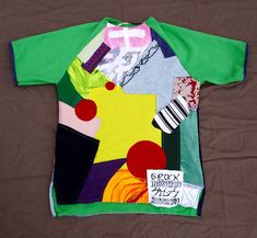 a child's t - shirt that has been made to look like an abstract painting