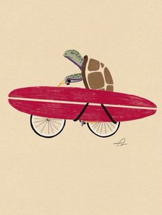 a red surfboard with a turtle riding on it's back in the air