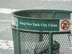 there is a sign on the fence that says keep new york city clean