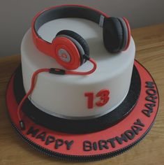 a birthday cake with headphones on top