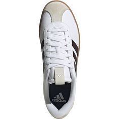 For that classic adidas look, lace up the VL Court 3. 0 Shoe. Suede uppers provide a sleek background for the classic 3-Stripes design, and underfoot cushioning keeps us comfortable on active urban days. Synthetic Lace-up Skate Shoes With Three Stripes, Three Stripes Round Toe Skate Shoes For Sports, Low-top Skate Shoes With Three Stripes, White Running Shoes With Three Stripes For Sports, Sporty Skate Shoes With Laces For Sports, Sporty Lace-up Skate Shoes With Three Stripes, Sporty Lace-up Skate Shoes For Sports, Three Stripes Lace-up Skate Shoes, Classic Adidas Logo Skate Shoes For Sports