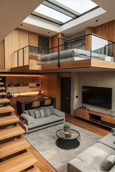 a living room filled with furniture under a skylight