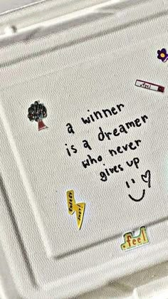 a piece of white paper with writing on it that says, a winner is a dreamer who never shut up