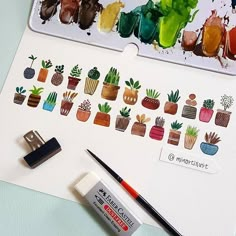 an image of some plants and paint on a paper with marker pens next to it