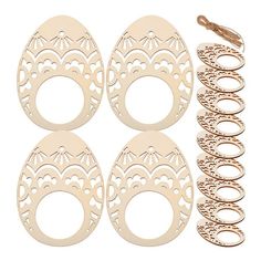 four pieces of wooden cutout with different shapes and sizes on the top one is gold