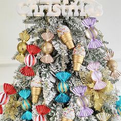 a christmas tree decorated with colorful ornaments