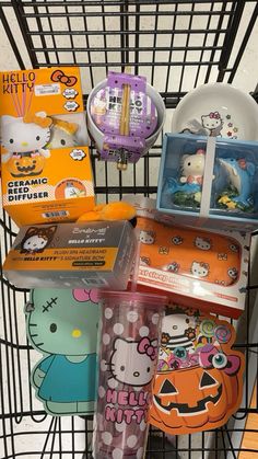 hello kitty products are stacked on top of each other in a shopping cart at a store