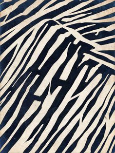 an animal print rug with black and white stripes