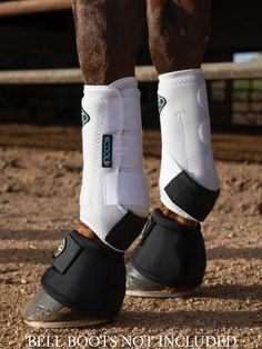 the legs and feet of a horse wearing boots