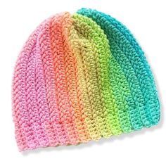 multicolored crocheted beanie on white background