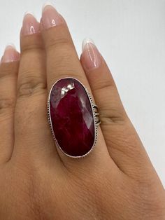 Unusual deep toned raw ruby low content silver setting handmade  size 8.5 Can be resized. My jeweler charges a $20 fee All rings are shipped in a nice gift box.   Check out our over a THOUSAND great reviews Engraving is $4 per letter and is not always perfect depending on the piece. It can take a few days if the jeweler is busy. This is payable to Paypal Judithsltd@gmail.com Ruby Jewelry With Large Stone For Gift, Oval Ruby Ring With Large Stone For Gift, Spiritual Ruby Ring As A Gift, Faceted Ruby Ring In Sterling Silver For Gift, Faceted Ruby Ring In Sterling Silver As Gift, Handmade Silver Ruby Ring, Silver Ruby Ring With Large Stone For Anniversary, Spiritual Oval Ruby Ring, Untreated Ruby Ring Gift