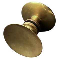 an antique brass door knob on a white background