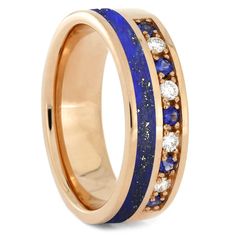 a wedding ring with blue and white stones on it, set in 18k yellow gold