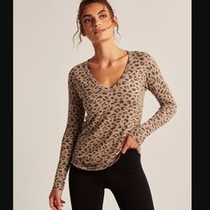 New With Tags! Color: Light Brown Leopard Print Only Size Xs Available But Can Fit Other Sizes As Well Model: 5'9" Wearing Size S Cozy Long-Sleeve Tee In Our Softaf Fabric And Legging-Friendly Length With Curved Hem And V-Neckline. Imported. Body:48% Viscose, 48% Polyester, 4% Elastane Taken From Size S Sleeve Length: 30" Body Length: 28" Same To Next Day Shipping! Open To Reasonable Offers Casual Winter Tops With Thumbholes, Winter Loungewear Tops With Thumbholes, Cozy Winter Stretch Tops, Cozy Stretch Long Sleeve Tops, Cozy Long Sleeve Stretch Tops, Winter Long Sleeve Top With Thumbholes For Loungewear, Stretch Tops With Thumbholes For Fall, Cozy Long Sleeve Tops, Trendy Long Sleeve Top With Cozy Fit