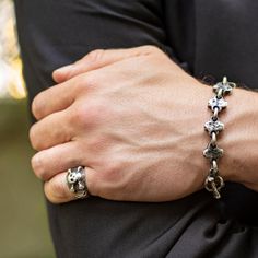 Like buried treasure, this weather worn Pirate Ring lives by a sense of Carpe Diem - Latin for “seize the day". An unstoppable sense of freedom comes when we acknowledge our time is limited and we begin to truly make the most of every day. Featuring the pirate's emblem of mayhem and good times, the Jolly Roger skull 'n crossbones with an Iron Cross at each side. This ring is full of confidence, without fear. Worn here with our Jumbo Cruz Link Bracelet in antiqued silver. Antiqued sterling silver Pirate Symbols, Pirate Ring, The Jolly Roger, Sterling Silver Skull Rings, Silver Skull Ring, Buried Treasure, Iron Cross, Seize The Day, Diamond Eyes