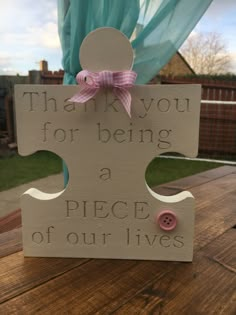 a wooden sign that says thank you for being a piece of our lives