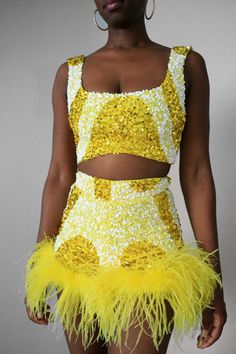 "Get glam in our Yellow Sequin Swirl Bow Back Crop Top. This piece has an all-over two-tone yellow and white sequin swirl motif design. The fabric is stretchy and has a tie-back for easy wearing. Perfect for your special events such as a birthday, wedding events, date nights, and much more. Pair it with our matching Yellow Sequin Feather Shorts >>https://www.etsy.com/listing/1449593760/yellow-white-swirl-sequin-feather-shorts?click_key=4bf8fb56d9f0e826de57081c17cc0afe73ca31af%3A1449593760&click_ Feather Shorts, Party Crop Tops, Jazz Dress, Yellow Sunshine, Get Glam, Bridal Jumpsuit, Sequin Jumpsuit, Sequin Crop Top, Sequin Shirt