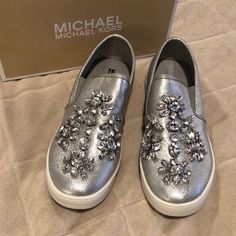 Girls Michael Kors Slip On Shoe. New, Never Worn Spring Party Slip-on Sneakers, Michael Kors Slip-on Sneakers For Spring, Trendy Michael Kors Sneakers For Spring, Silver Slip-on Sneakers For Spring, Party Sneakers For Spring, Spring Party Sneakers, Michael Kors Slip On, Mk Shoes, Girls Tennis Shoes