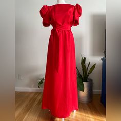 Vintage 70s Maxi Party/Formal Dress With Puff Sleeves, Deep V Back, & Elegant Train In The Back. Beautiful Bright Red In Color. The Dress Has A Zipper Closure In The Back. In Great Vintage Condition With No Noted Major Flaws Such As Stains Or Holes. Size 10 Tag, But Would Best Fit A Modern Extra Small Or Small. Measurements: Shoulder To Shoulder-13.5” Bust/Armpit To Armpit-18” Waist-13” Hips-23” Length-57” Sleeves-10” ***All Measurements Taken With Item Laying Flat & Should Be Doubled Where Needed*** Please Ask As Many Questions As You Need To, Prior To Buying An Item. Party Formal Dress, Colorful Dresses Formal, Dress With Puff Sleeves, Dress Clothes For Women, Formal Dress, Bright Red, Puff Sleeves, Deep V, Vintage 70s