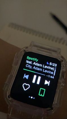 an apple watch with the screen lit up