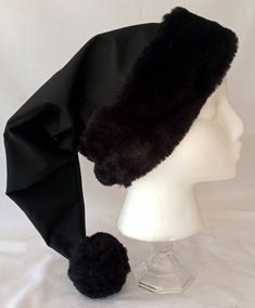 Please read to the very end for shop language and product description Unquestionably one of our most unusual and most popular hats. This solid black Christmas hat is made from black breathable cotton, lined with cotton, and features our exclusive black fur brim/flocking and pom pom, this hat is certainly a conversation piece. It is certainly a rarity to see a solid black Christmas hat, surely everyone will want to know where you got it from. (The Black Brim/flocking and pom pom can be substitute Black Beanie Costume Hat For Winter, Black Beanie For Winter - Costume Hat, Black Cap For Winter Costume, Merry Gothmas, Black Santa Hat, Black Christmas Tree Decorations, Santa Hat Png, Winter Angel, Horror Room