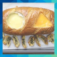 baked bread with cheese and pesto on it